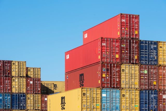 Stacked shipping containers at a freight terminal
